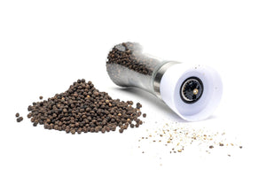 whole black peppercorns from Sri Lanka and a Pepper grinder
