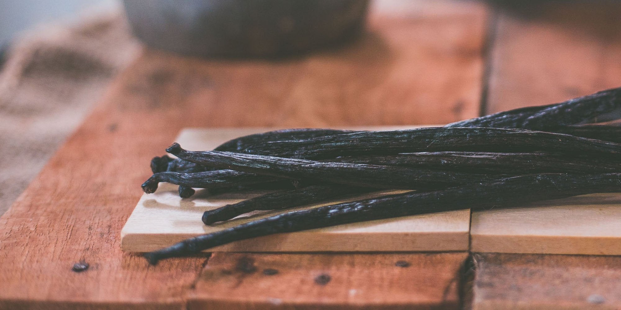 vanilla beans on a wooden table